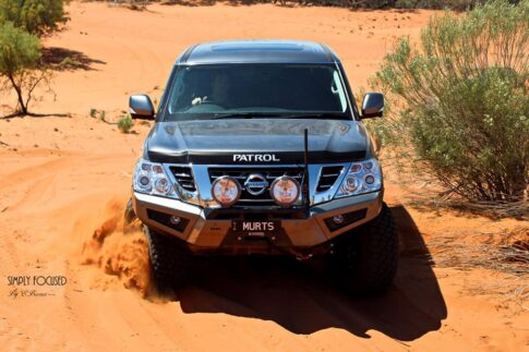 Car driving in sand for Torqit website