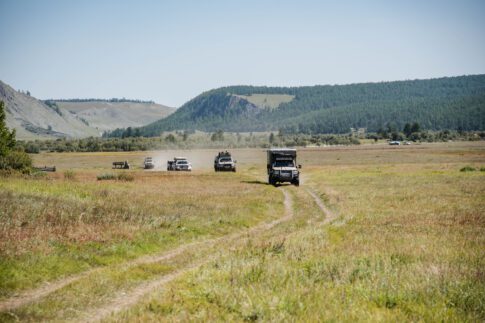4WDs driving through field in Torqit video