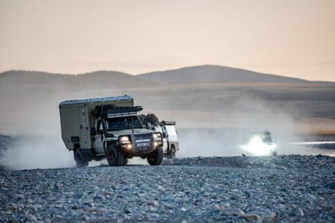 Car driving in dust for Torqit website