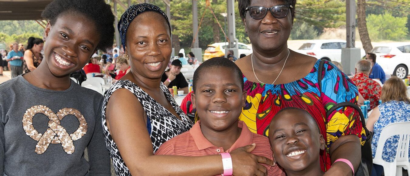 Banner on a housing provider website showing happy tenants