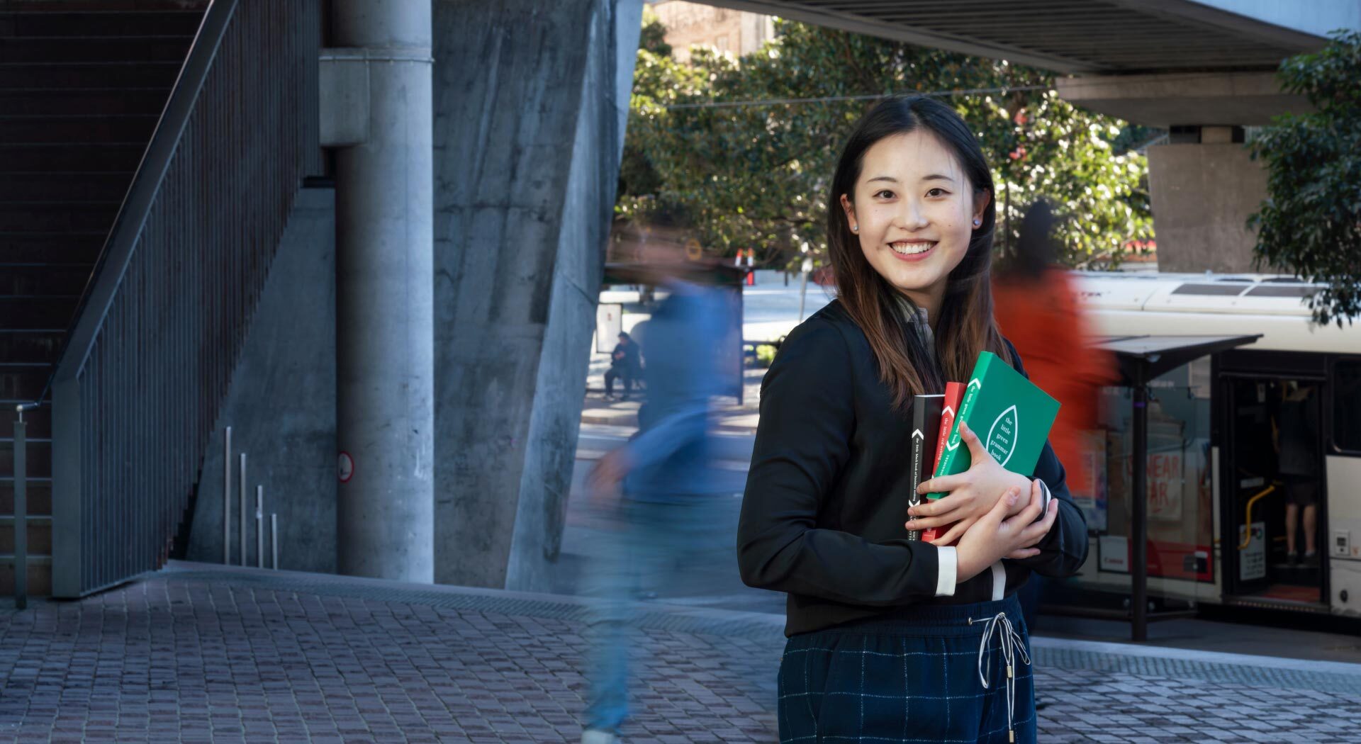 Lady smiling at Sydney university